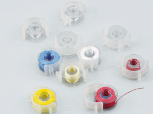 Canettes et clips de canette pour machines à coudre ou à broder Brother