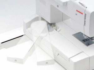 Machine à coudre et à broder JANOME Memory Craft 1000