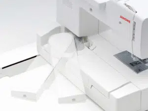 Machine à coudre et à broder JANOME Memory Craft 1000