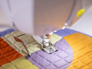 Machine à coudre et à quilter Inventio NV1850Q